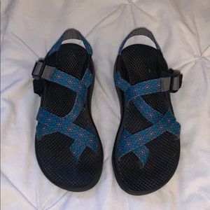 Blue, purple, and yellow Chacos